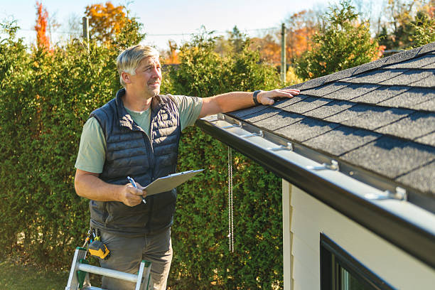 Professional Roof Replacement technician working in Wind Ridge, PA